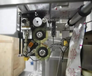 Aizmugures blīvējuma iepakošanas mašīnas detaļa - lentes kodēšanas printeris