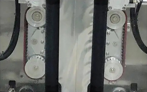 gusset pouch iepakošanas mašīnas detaļa - sinhronizēts maisa vilkšanas ritenis